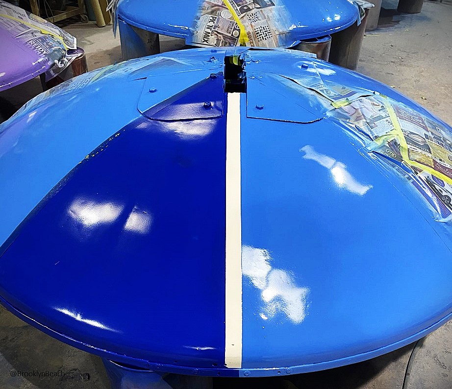 Electric dance Paratroopers unbrellas getting resprayed